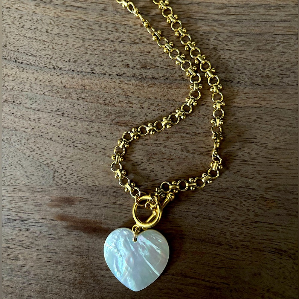Mother of pearl heart necklace on gold length chain